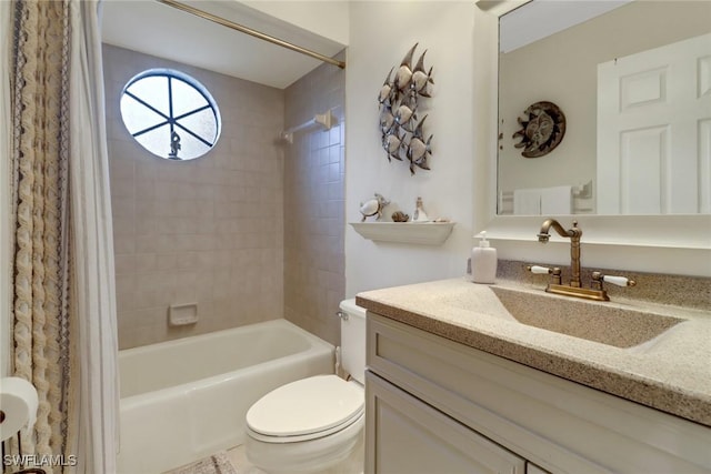 full bathroom featuring toilet, vanity, and shower / bath combo