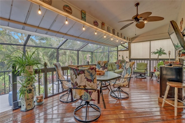 sunroom / solarium with vaulted ceiling and ceiling fan