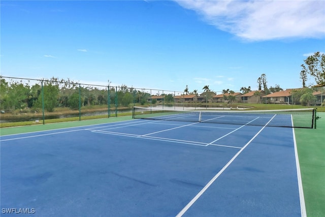 view of sport court featuring basketball hoop