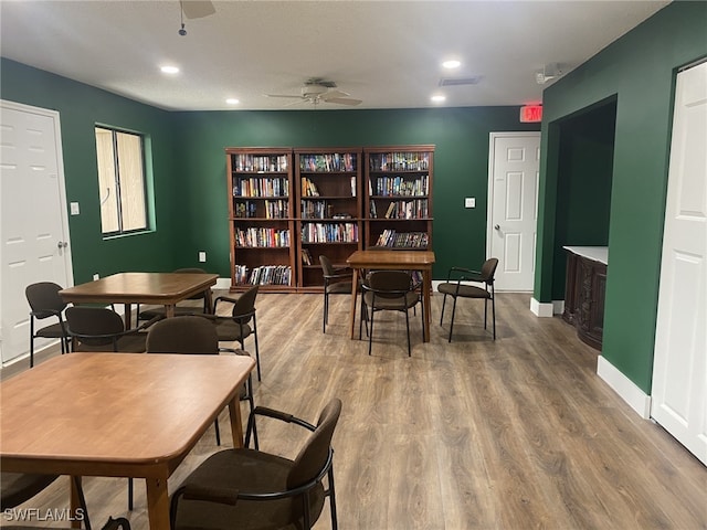 dining room featuring ceiling fan and hardwood / wood-style floors