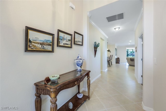 corridor featuring crown molding