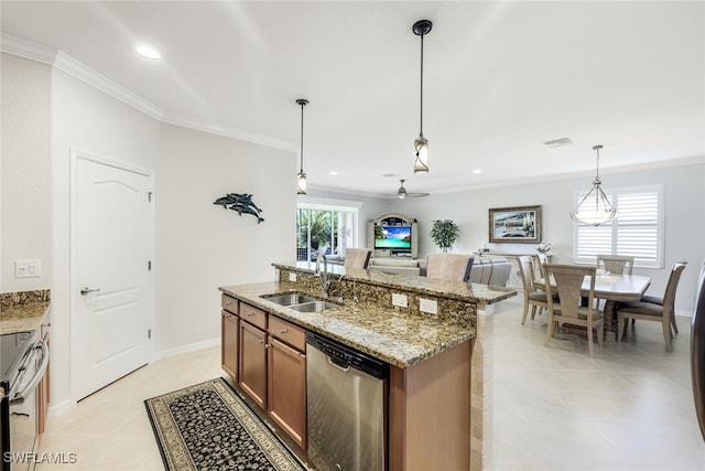 kitchen with dishwasher, sink, stove, an island with sink, and pendant lighting