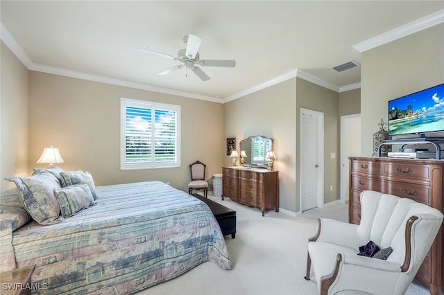 bedroom with light colored carpet, ceiling fan, and crown molding