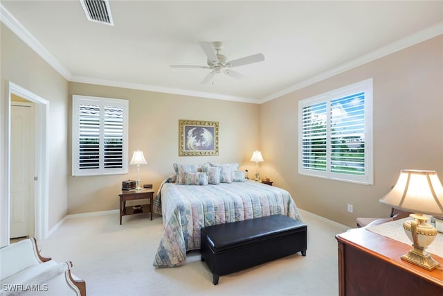 bedroom featuring light carpet, ceiling fan, and ornamental molding