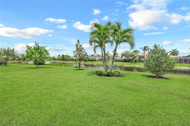 view of yard with a water view