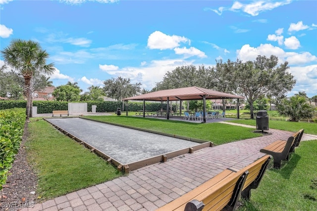 view of community with a gazebo and a lawn