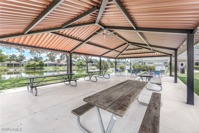 view of property's community featuring a gazebo and a water view