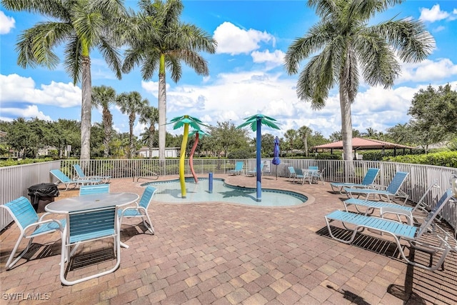 view of swimming pool featuring a patio area