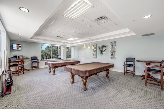 rec room featuring a paneled ceiling, light carpet, billiards, ceiling fan, and a tray ceiling