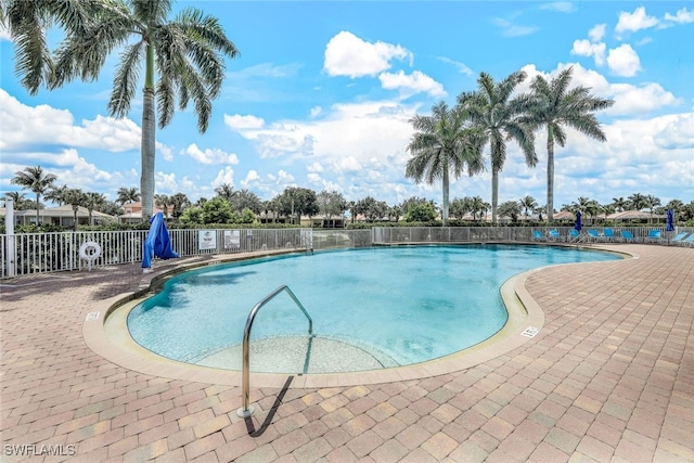 view of swimming pool featuring a patio