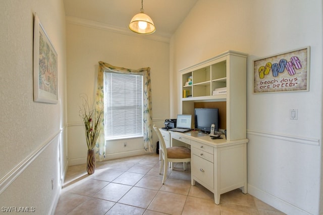 office featuring crown molding and light tile patterned flooring