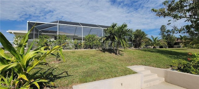 view of yard featuring a lanai