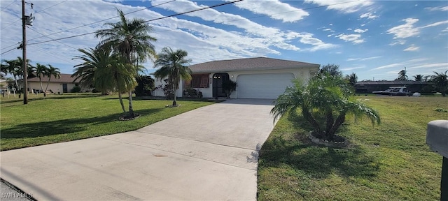 ranch-style home with a garage and a front lawn