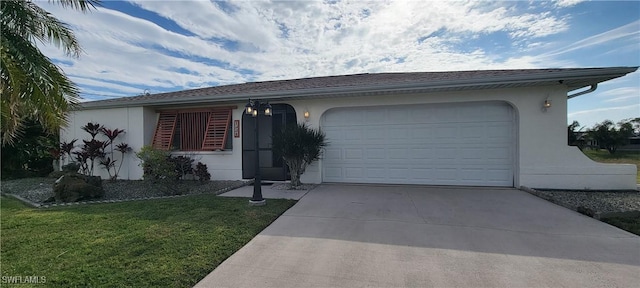 ranch-style home with a front yard and a garage