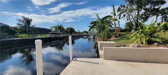 dock area featuring a water view