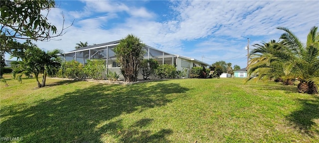 view of yard featuring a lanai