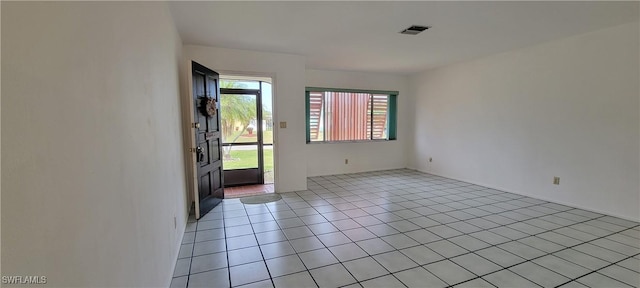 view of tiled spare room