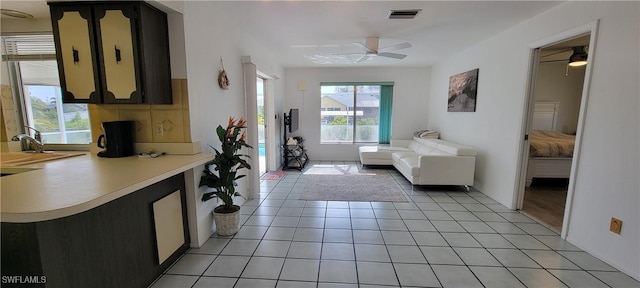 interior space featuring ceiling fan