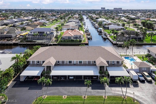 bird's eye view with a water view