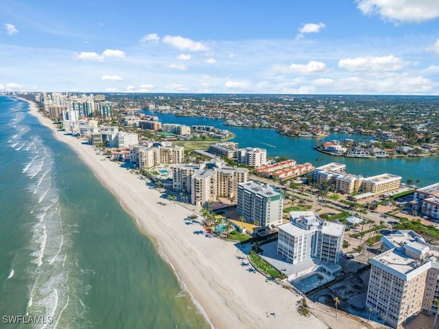 aerial view featuring a water view and a beach view