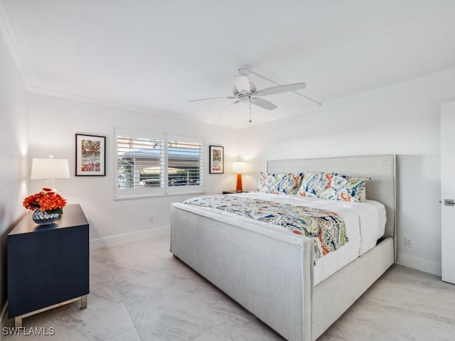 bedroom featuring ornamental molding and ceiling fan