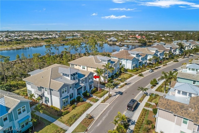 bird's eye view with a residential view and a water view