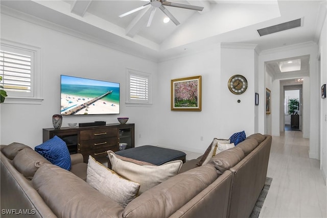 living room with visible vents, vaulted ceiling with beams, a ceiling fan, and ornamental molding