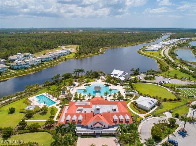 aerial view with a view of trees and a water view