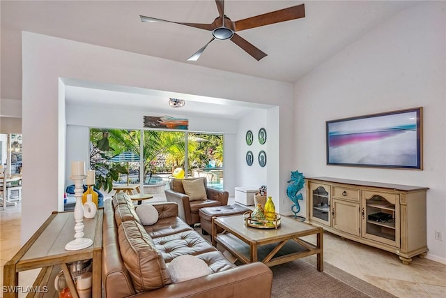 tiled living room featuring ceiling fan