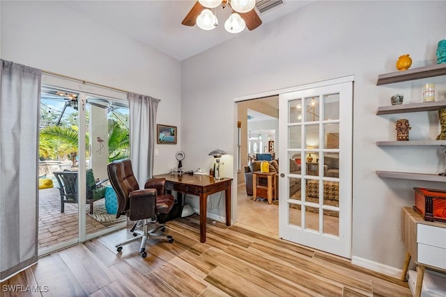 office space with ceiling fan and french doors