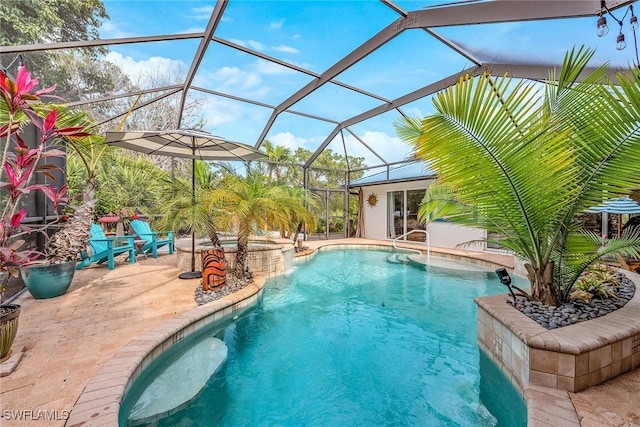 view of swimming pool with a lanai, a patio area, and pool water feature