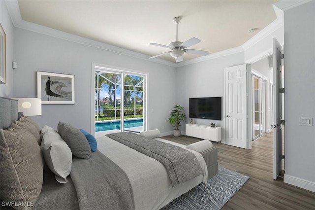 bedroom featuring access to exterior, wood finished floors, baseboards, and ornamental molding