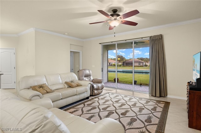 living room with ceiling fan, crown molding, and light tile patterned flooring