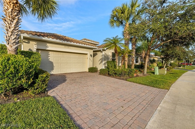 view of front of home with a garage