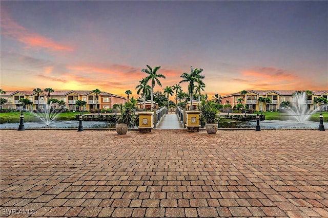 exterior space with a water view