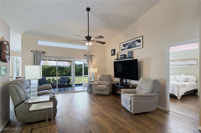 living room with ceiling fan, dark hardwood / wood-style flooring, and high vaulted ceiling