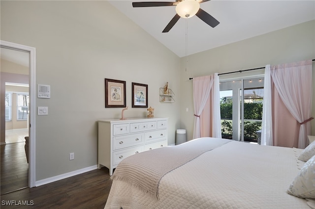 bedroom featuring multiple windows, access to exterior, dark hardwood / wood-style floors, and ceiling fan