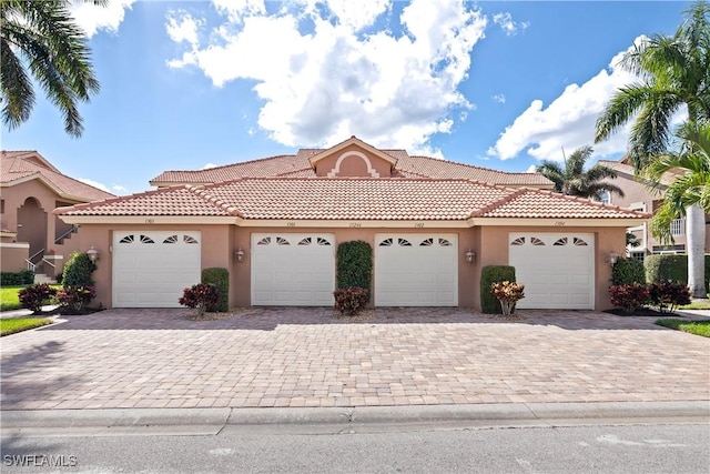 view of front of property with a garage