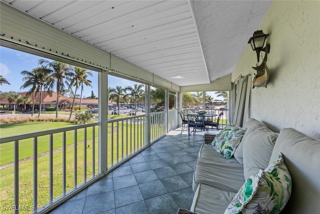 sunroom featuring a wealth of natural light