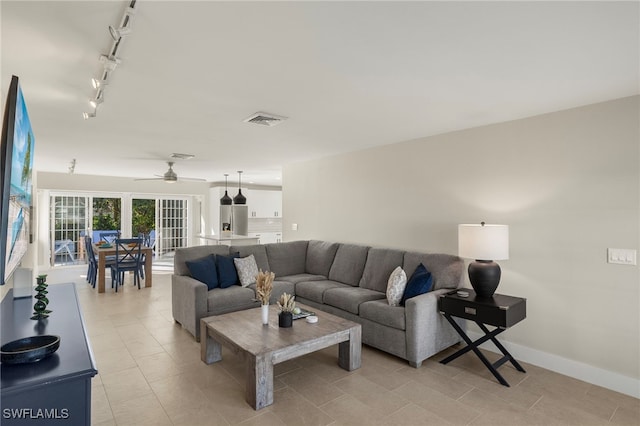 living room with ceiling fan