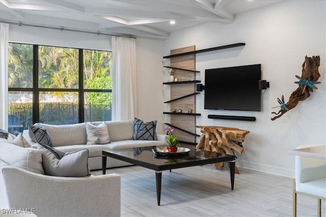 living room with beam ceiling