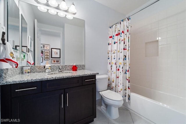 full bathroom featuring tile patterned flooring, vanity, shower / bath combo, and toilet