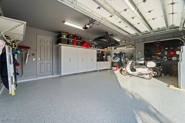 garage featuring a garage door opener