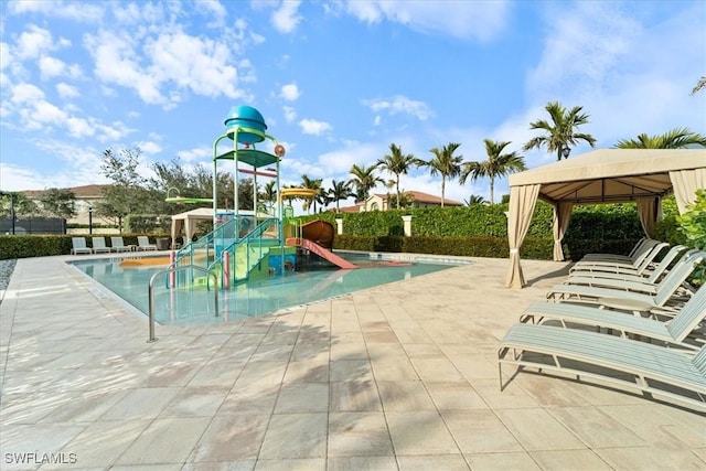 view of playground featuring a gazebo, a patio area, and a community pool