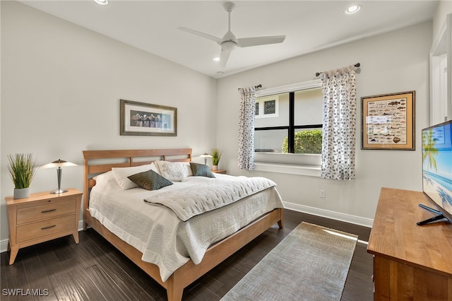 bedroom featuring ceiling fan and dark hardwood / wood-style flooring