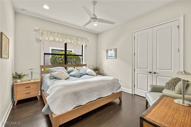 bedroom featuring dark hardwood / wood-style floors, a closet, and ceiling fan