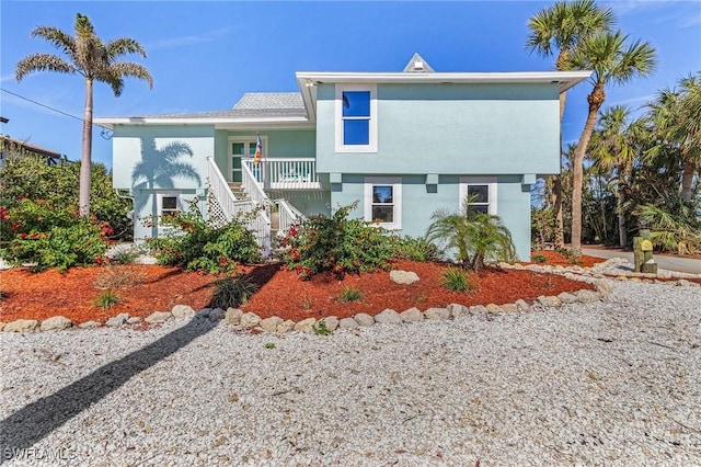 view of front of property featuring covered porch