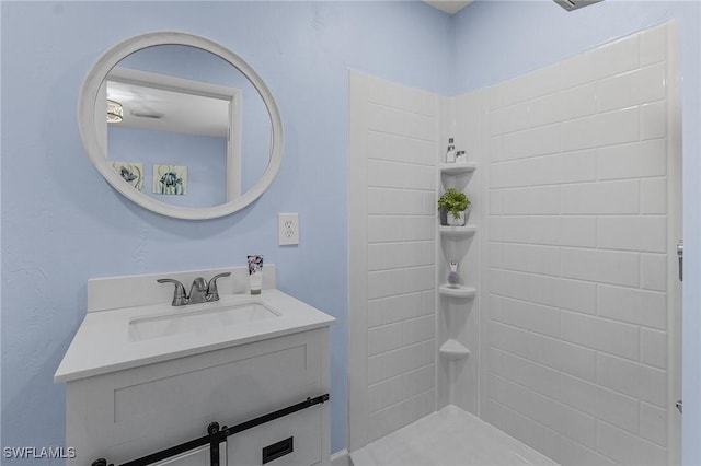 bathroom with vanity and walk in shower