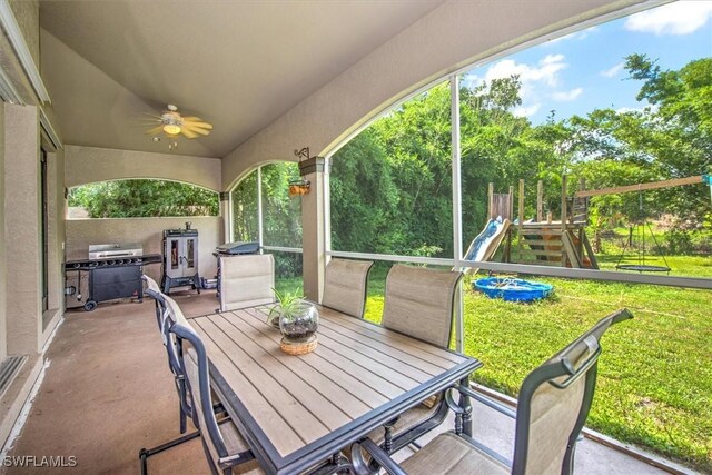 view of patio featuring a playground