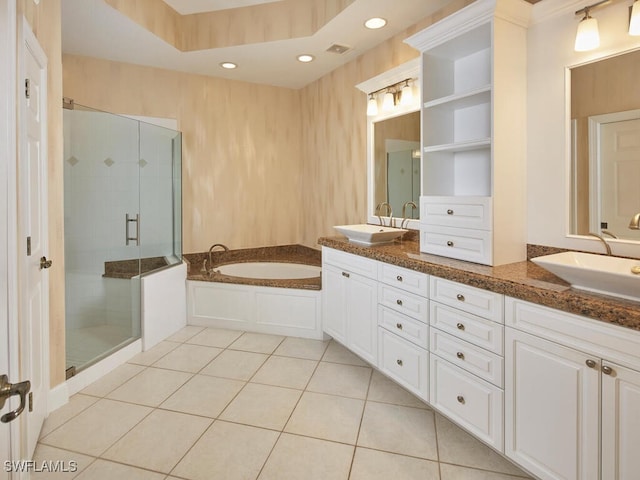 26916 Wyndhurst Ct Unit 102, Bonita Springs, FL 34134 - bathroom with a sink, a bath, tile patterned floors, and a shower stall